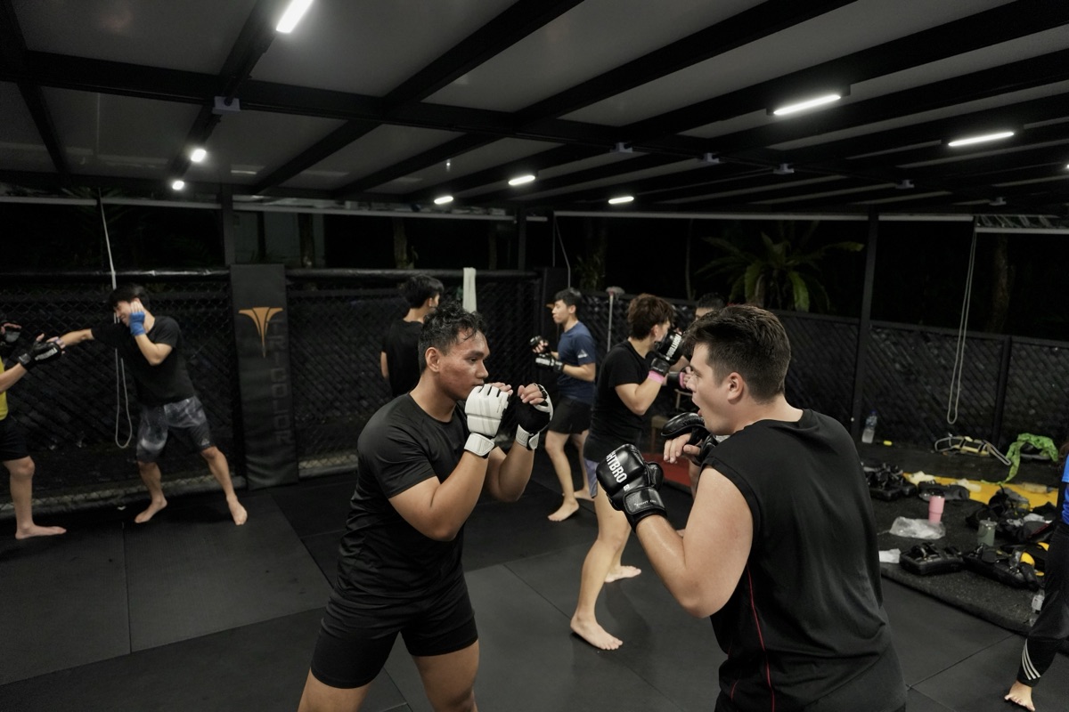 Covered training pavilion at 78 Rifle Range Road at night.