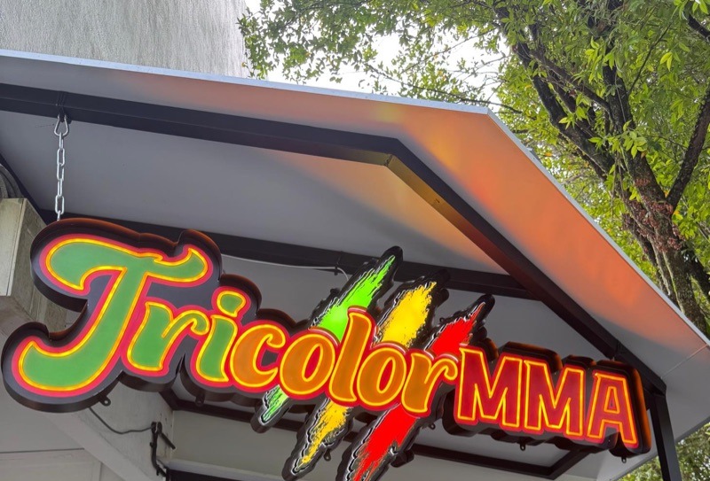 Tricolor MMA sign at 78 Rifle Range Road.